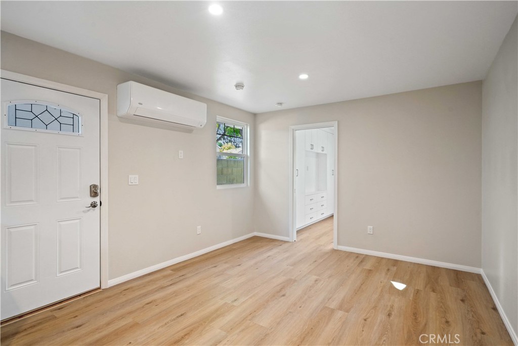 25510 Chisom Lane Stevenson Ranch, CA 91381 - Photo 37 of 53 a view of an empty room and wooden floor