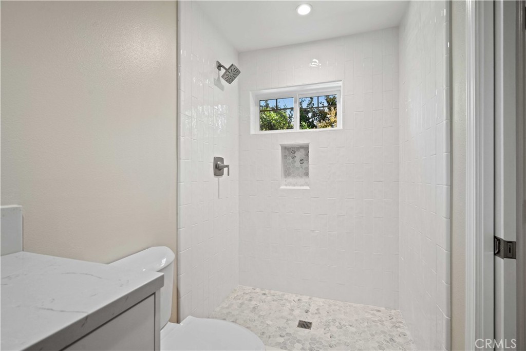 25510 Chisom Lane Stevenson Ranch, CA 91381 - Photo 40 of 53 a bathroom with a sink toilet and window