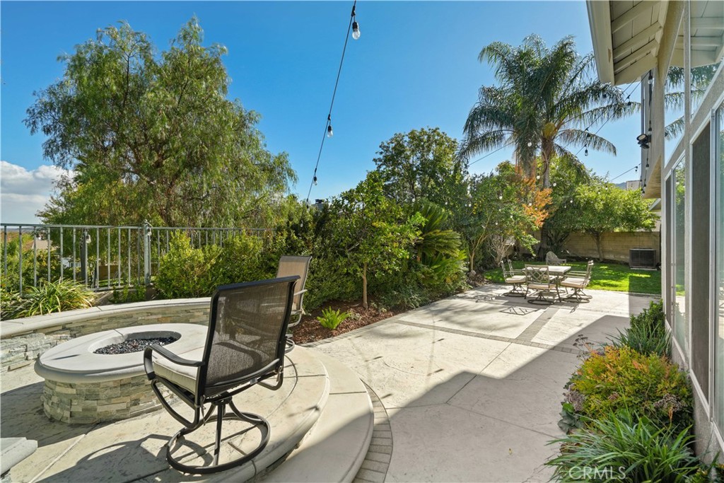 25510 Chisom Lane Stevenson Ranch, CA 91381 - Photo 45 of 53 a view of a chair and tables in the patio