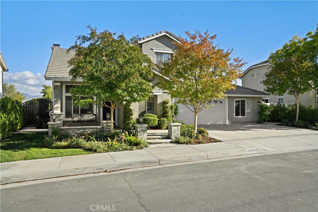 25510 Chisom Lane Stevenson Ranch, CA 91381 - Photo 52 of 53 front view of a house with a street