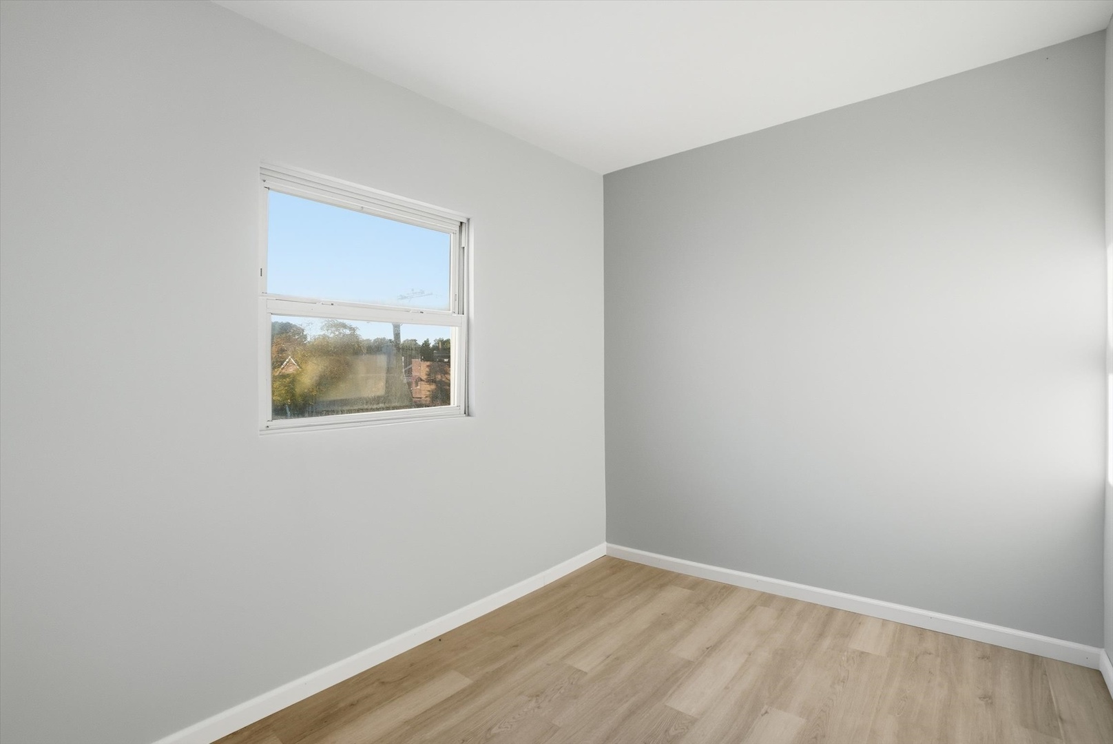 8434 South Drexel Avenue Chicago, IL 60619 - Photo 12 of 19 an empty room with a window