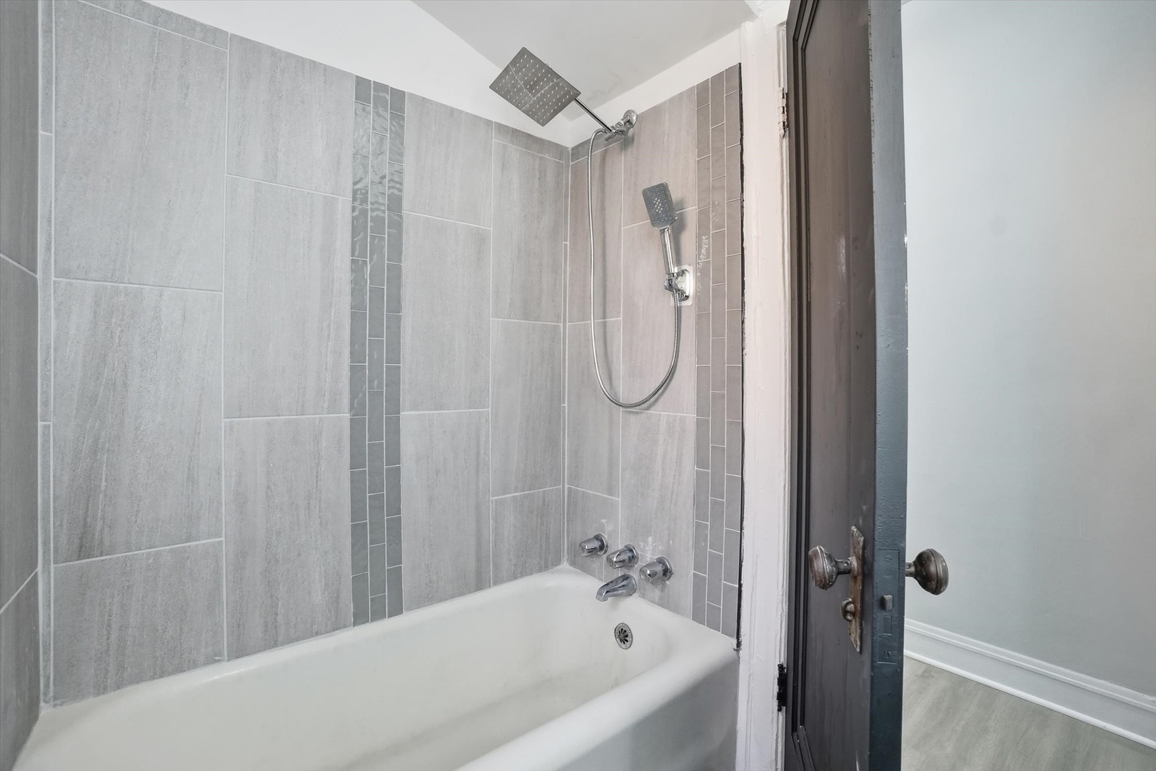 8434 South Drexel Avenue Chicago, IL 60619 - Photo 7 of 19 a bathroom with a bath tub and shower