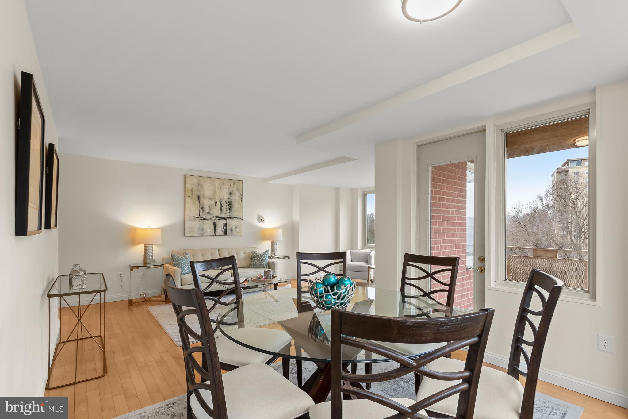 4000 Tunlaw Road Northwest, Unit 1007 Washington, DC 20007 - Photo 10 of 50 a view of a dining room with furniture and a window