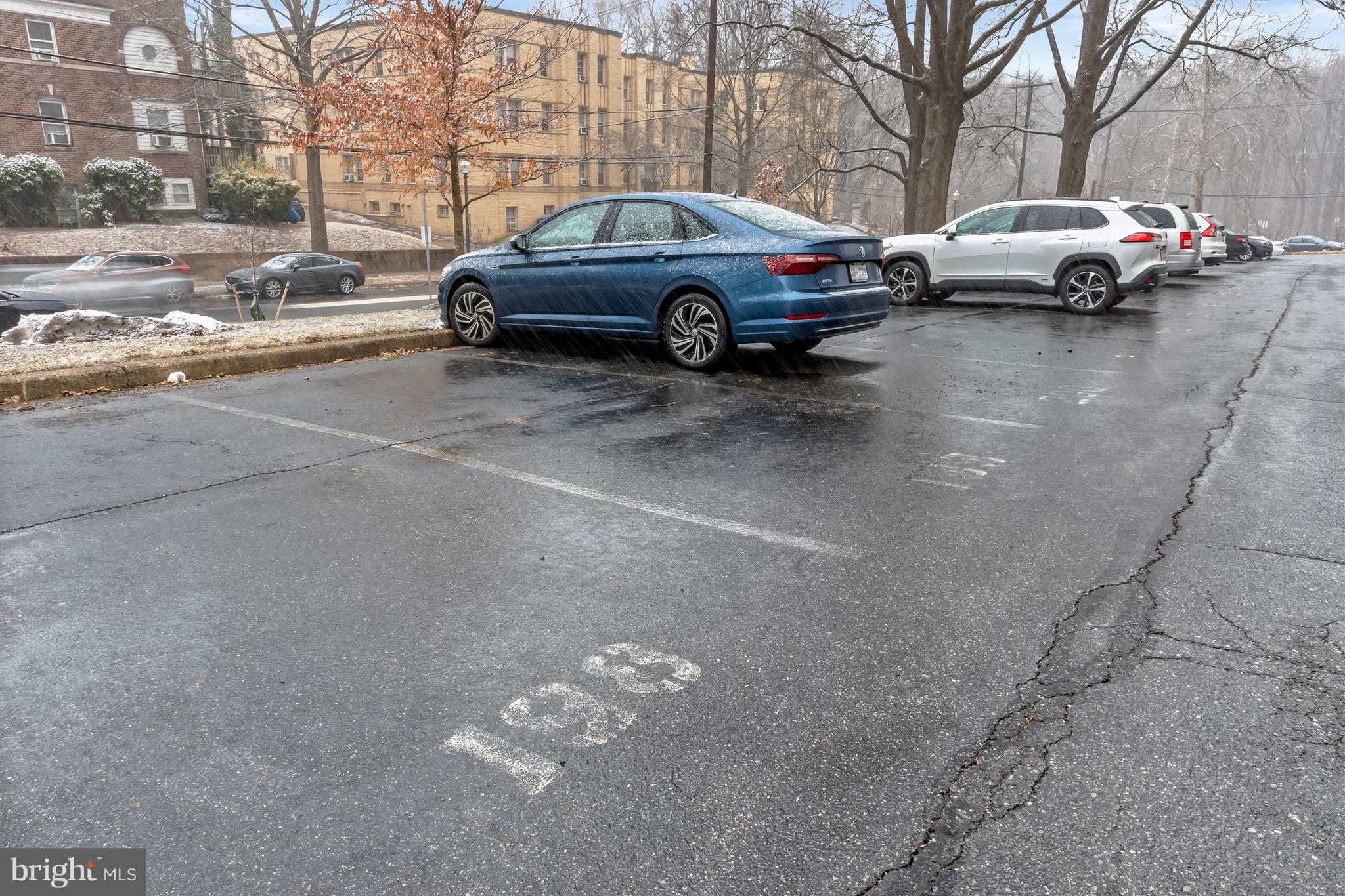 4000 Tunlaw Road Northwest, Unit 1007 Washington, DC 20007 - Photo 29 of 50 a view of cars parked on the side of a street