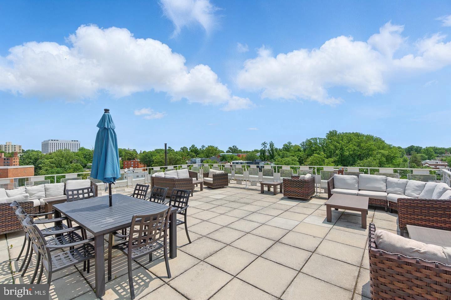 4000 Tunlaw Road Northwest, Unit 1007 Washington, DC 20007 - Photo 31 of 50 an outdoor space with furniture and garden