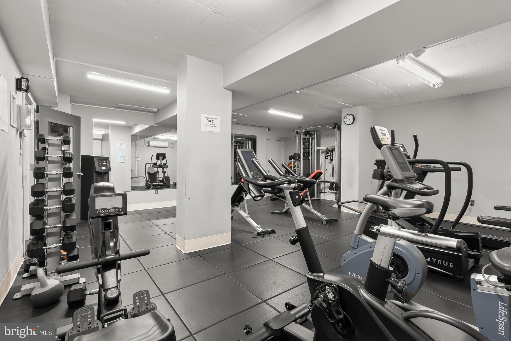 4000 Tunlaw Road Northwest, Unit 1007 Washington, DC 20007 - Photo 34 of 50 a view of a room with gym equipment