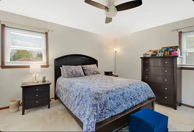 a bedroom with a bed and a closet