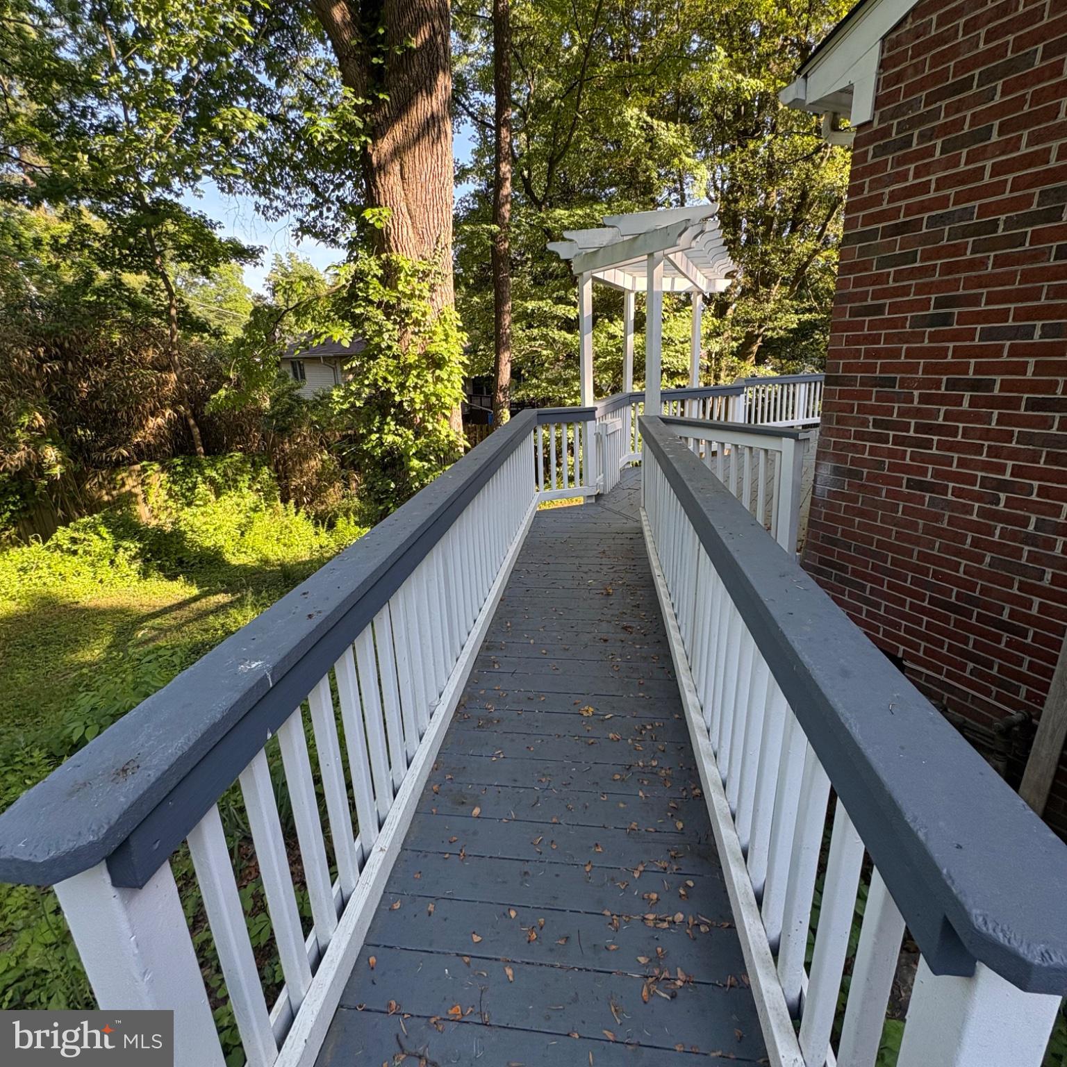 3502 Holly Road Annandale, VA 22003 - Photo 10 of 57 a view of a balcony with wooden stairs