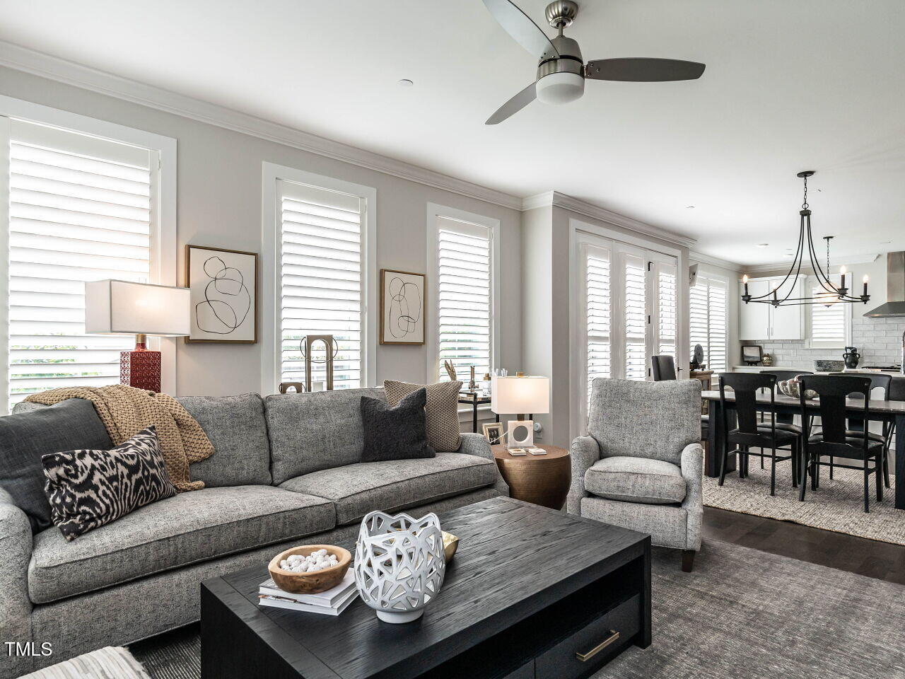 1610 Draper View Loop, Unit 101 Raleigh, NC 27608 - Photo 10 of 39 a living room with furniture and a large window