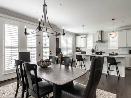 a living room with a fireplace and a flat screen tv
