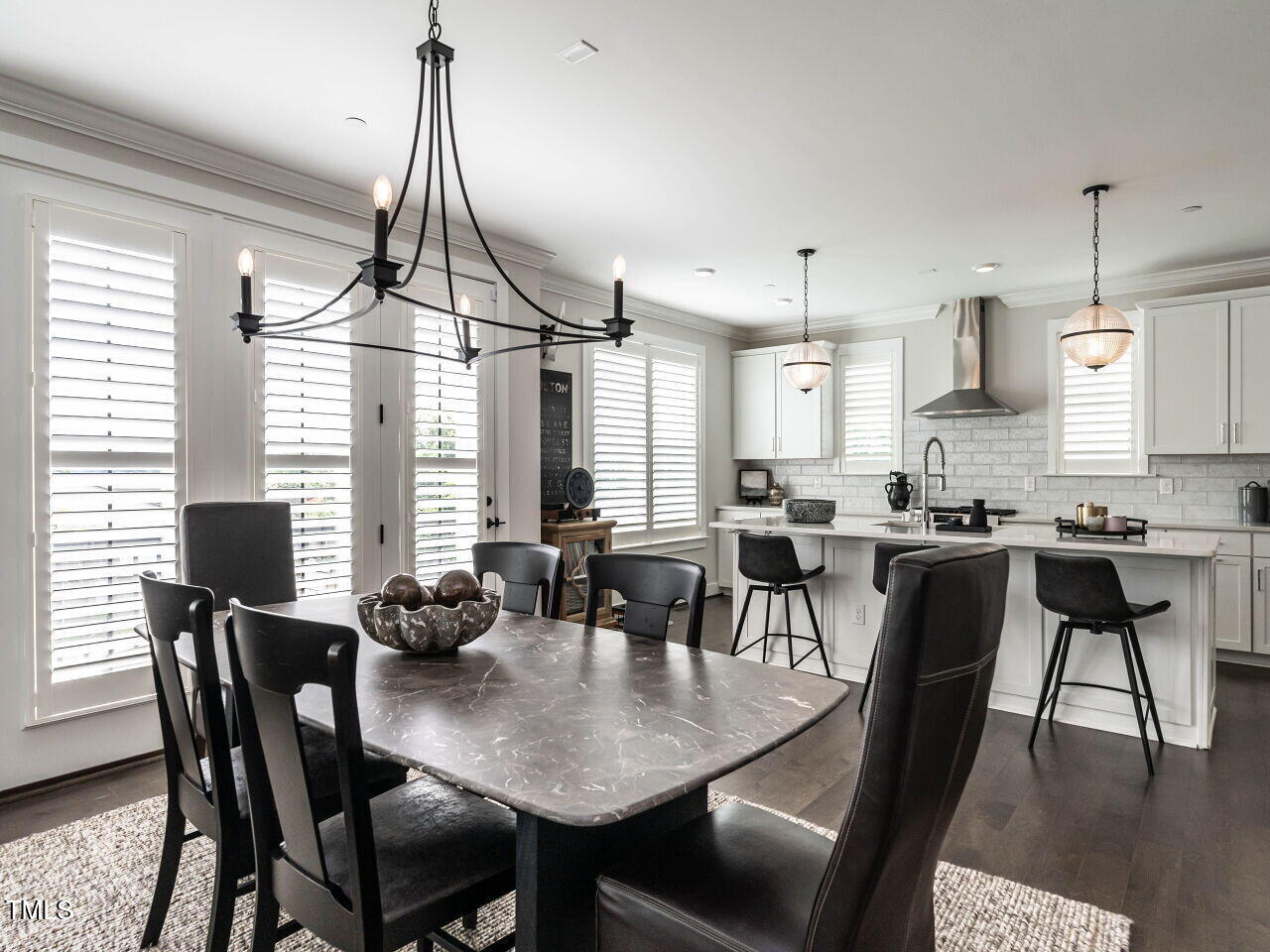 1610 Draper View Loop, Unit 101 Raleigh, NC 27608 - Photo 11 of 39 a view of a dining room with furniture
