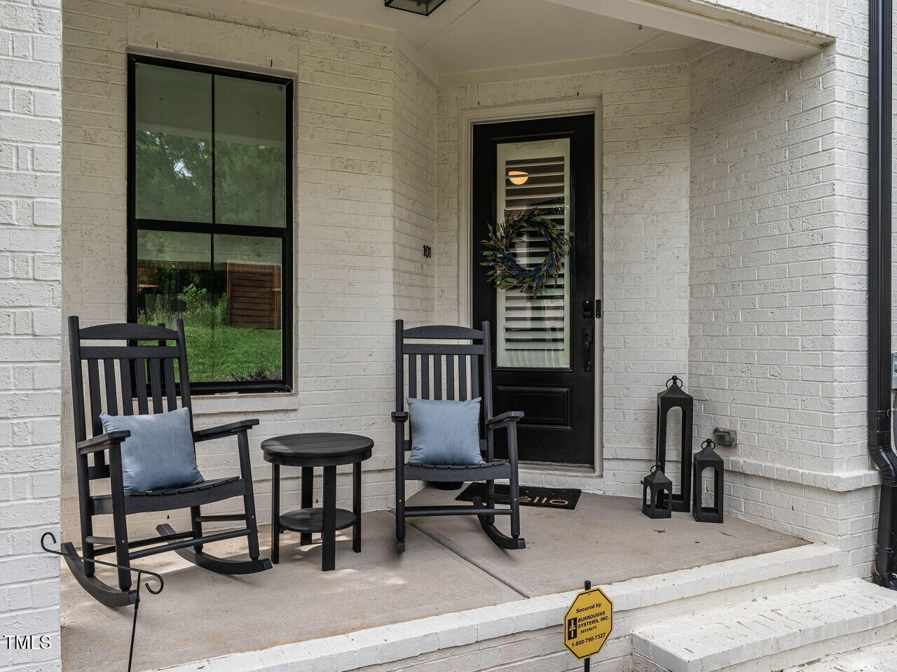 1610 Draper View Loop, Unit 101 Raleigh, NC 27608 - Photo 2 of 39 a view of a workspace with furniture and windows