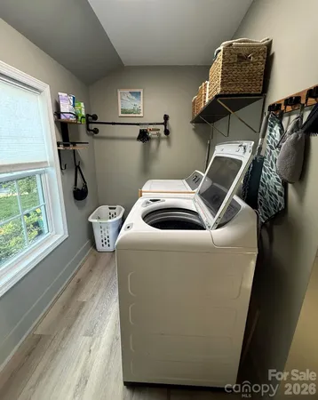 a utility room with dryer and washer