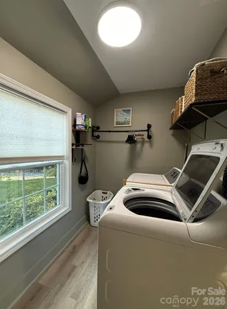 a room with a bed and a window