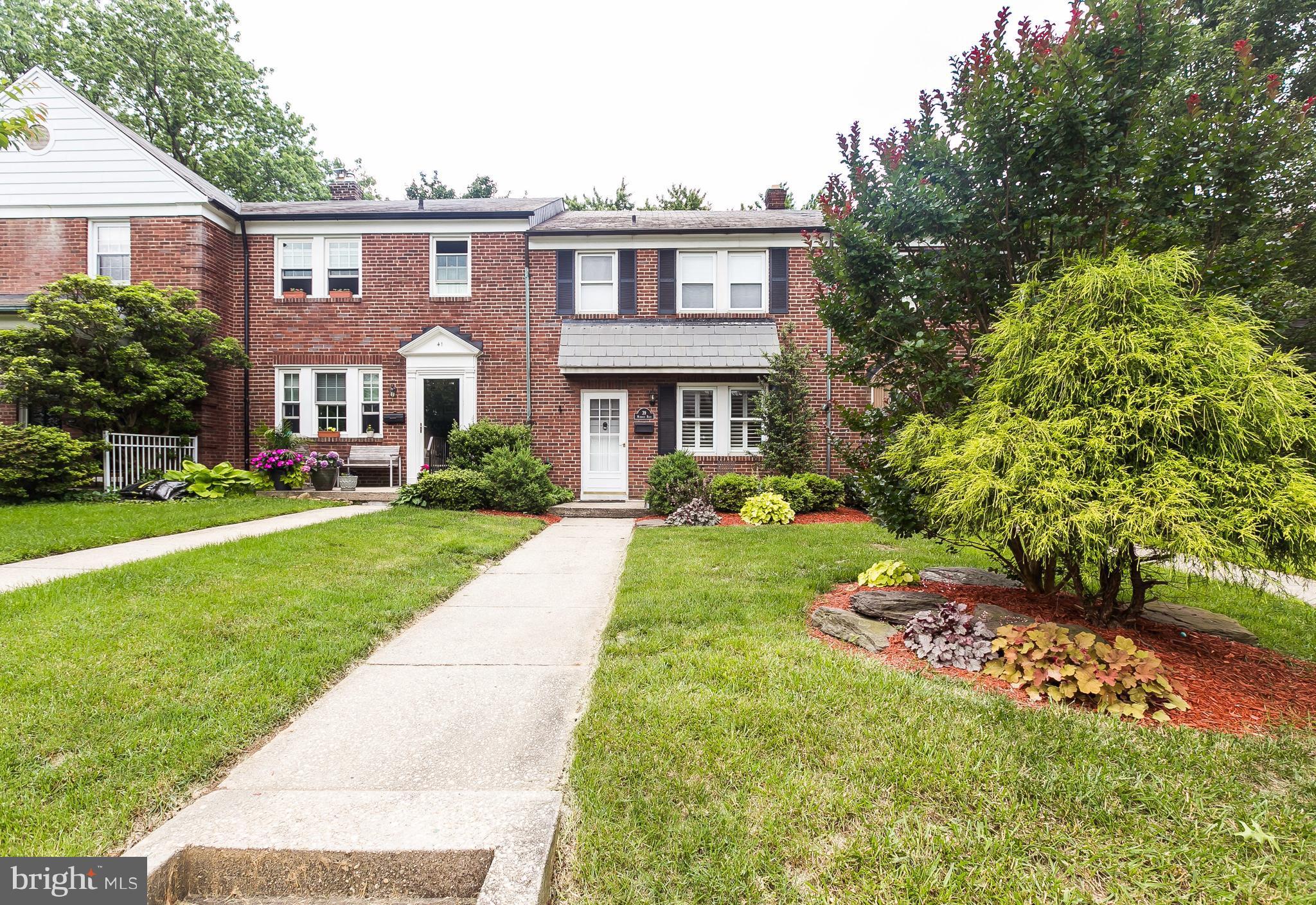 39 Murdock Road Baltimore, MD 21212 - Photo 2 of 28 a front view of a house with a yard