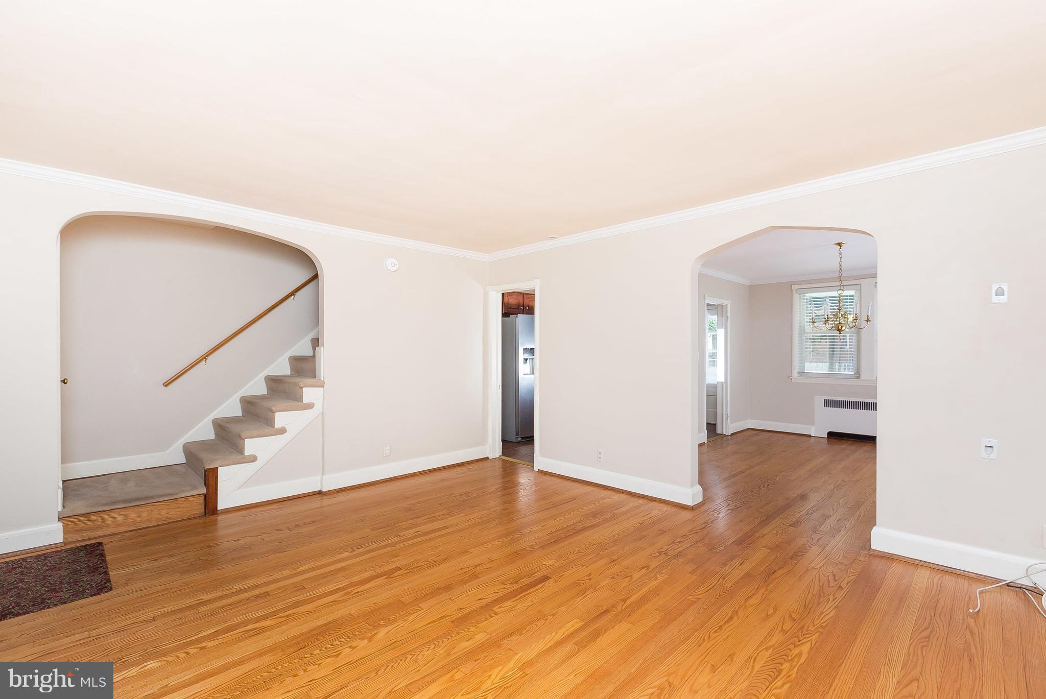 39 Murdock Road Baltimore, MD 21212 - Photo 7 of 28 a view of empty room with wooden floor