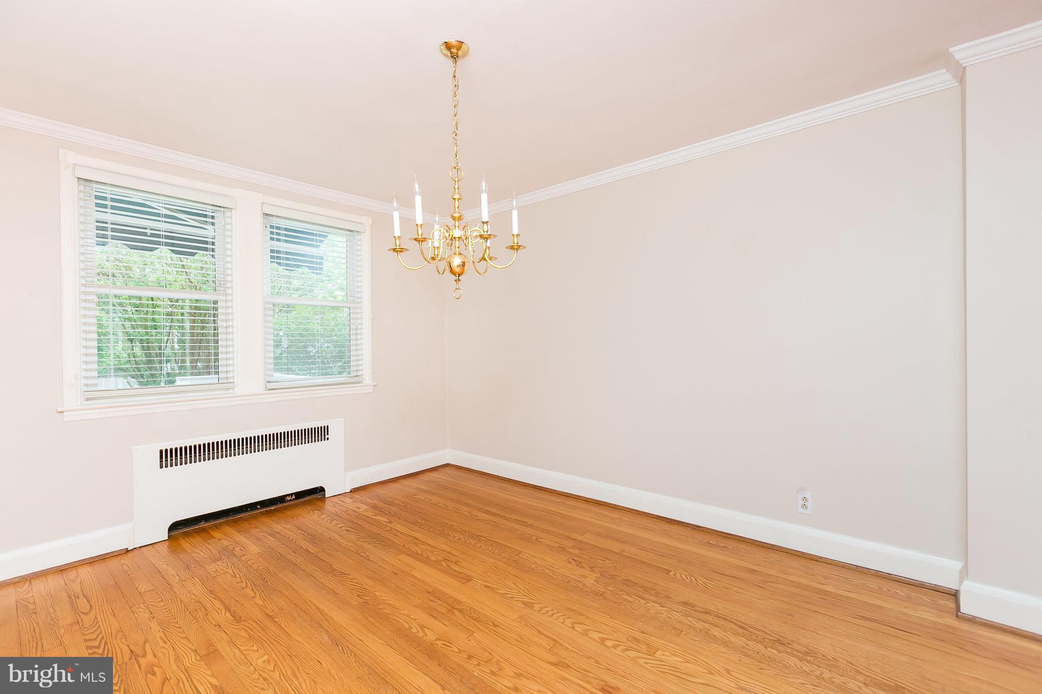 39 Murdock Road Baltimore, MD 21212 - Photo 8 of 28 a view of empty room with a window and chandelier