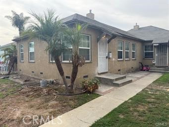 2293 Grand Long Beach, CA 90815 - Photo 2 of 7 a front view of a house with a yard