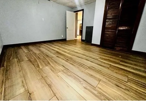 a view of an empty room with stairs