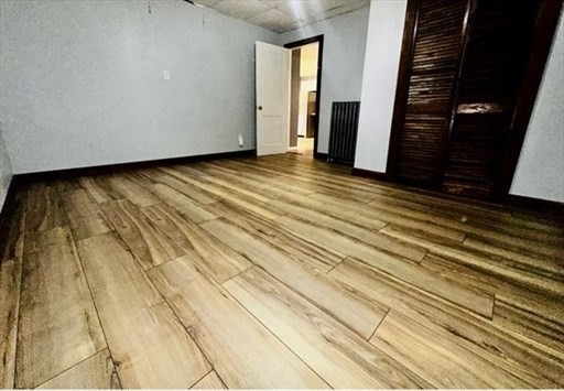 59 14th Avenue, Unit 2 Haverhill, MA 01830 - Photo 6 of 11 a view of an empty room with stairs