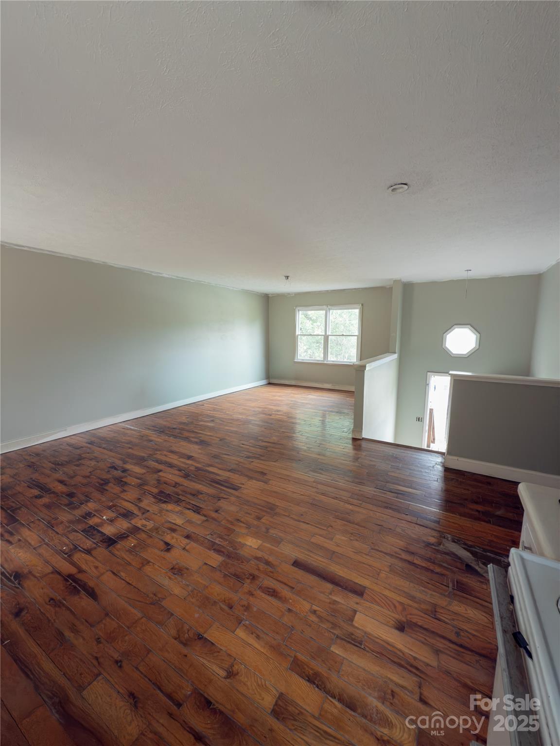 931 Emerald Place Southwest Lenoir, NC 28645 - Photo 2 of 10 a view of an empty room and window