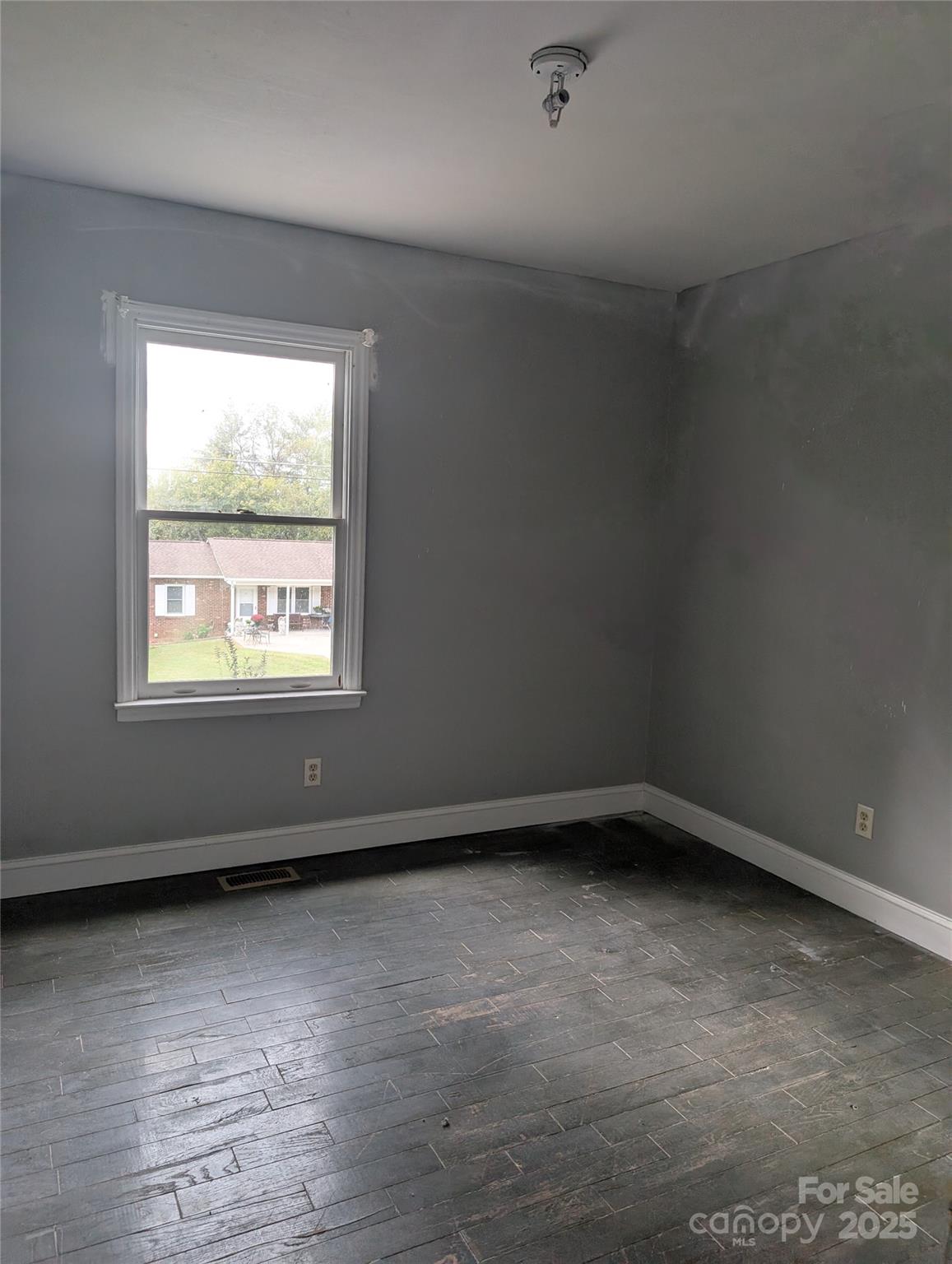 931 Emerald Place Southwest Lenoir, NC 28645 - Photo 8 of 10 an empty room with a window