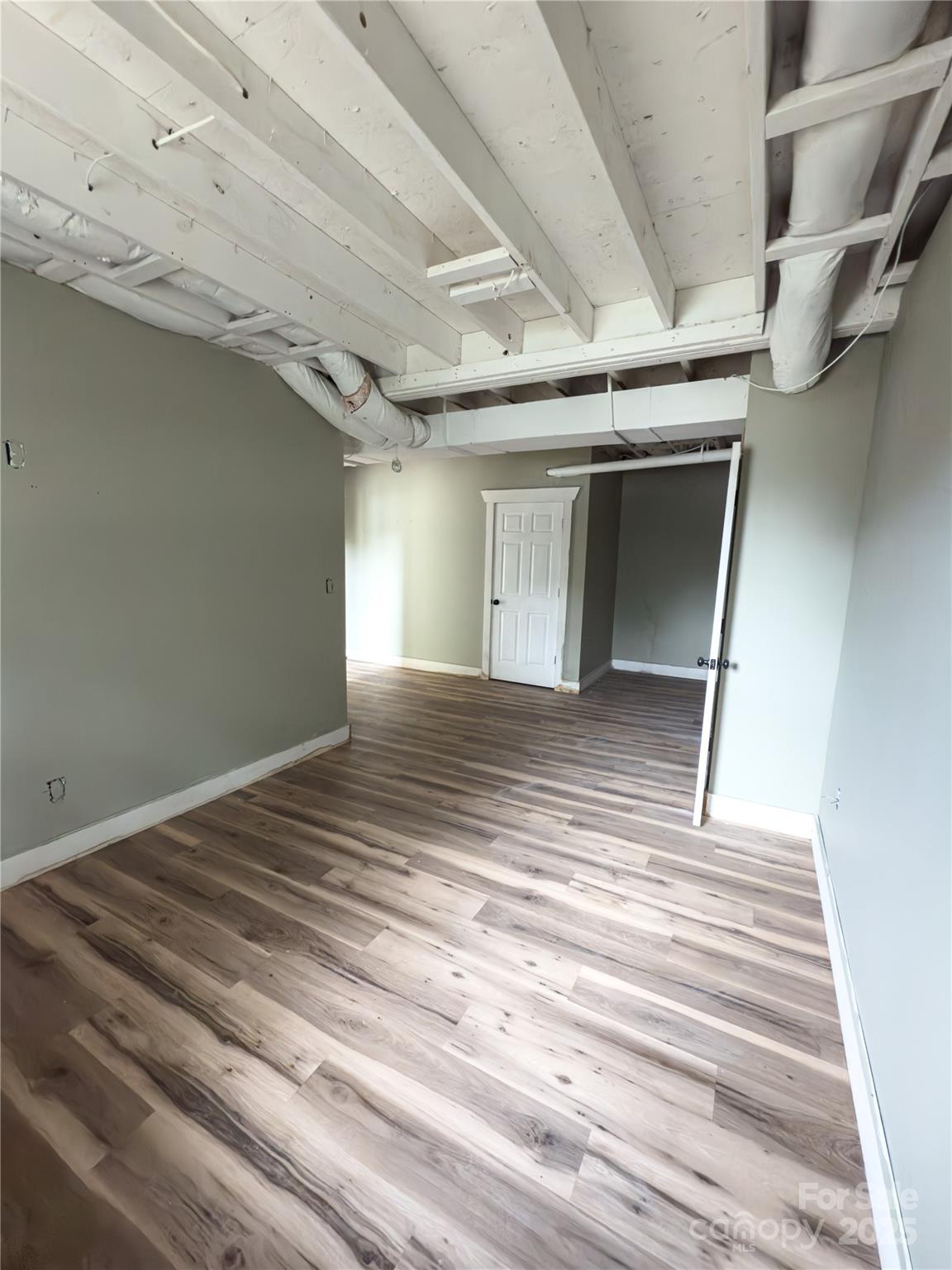931 Emerald Place Southwest Lenoir, NC 28645 - Photo 10 of 10 a view of a room with wooden floor