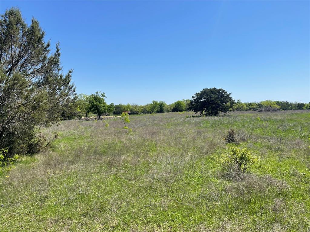 Tbd Lot 12 East Tbd Street Meridian, TX 76665 - Photo 15 of 31 a view of a lake with houses in the back