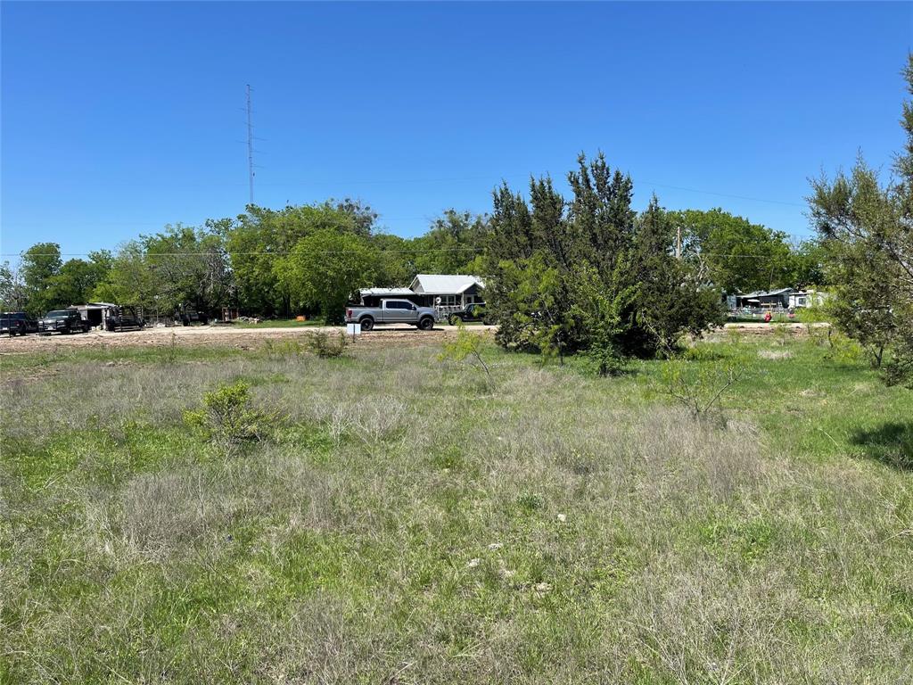 Tbd Lot 12 East Tbd Street Meridian, TX 76665 - Photo 16 of 31 a view of a large yard with an outdoor space