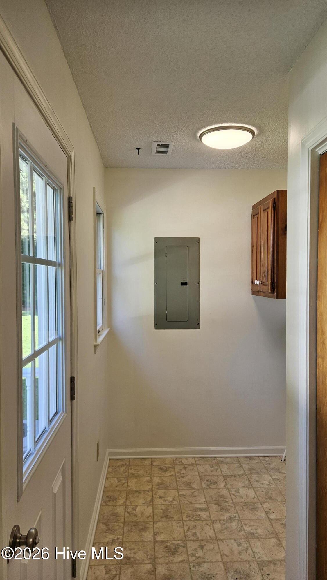 145 Launch Landing Road Moyock, NC 27958 - Photo 12 of 22 Rear door & Laundry room.