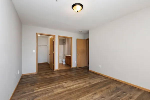 a view of a livingroom with wooden floor