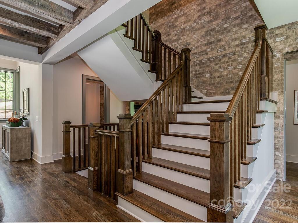 13601 Girl Scout Road Charlotte, NC 28278 - Photo 15 of 45 a view of entryway with wooden floor and stairs