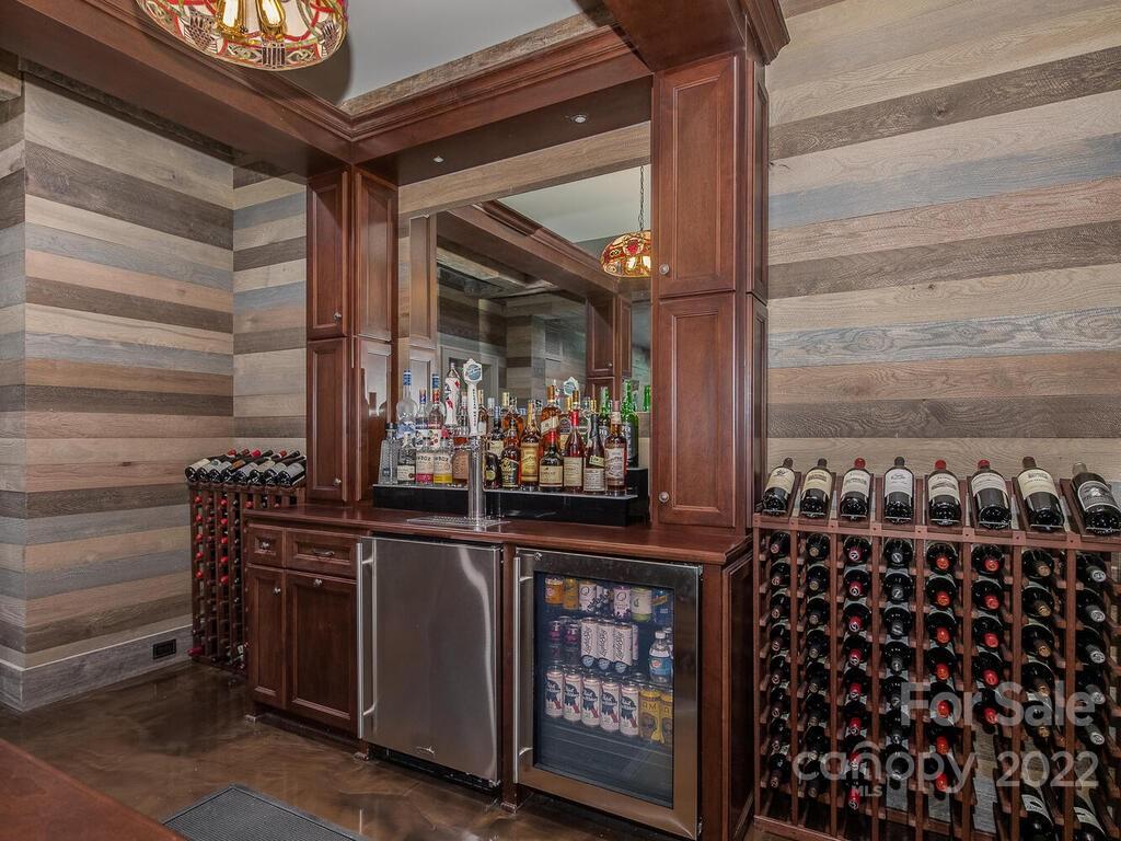 13601 Girl Scout Road Charlotte, NC 28278 - Photo 33 of 45 a room with lots of different colored cloths