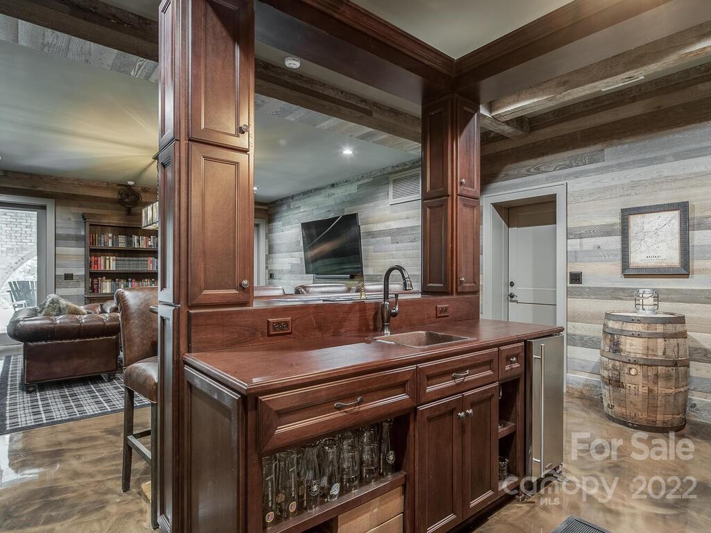 13601 Girl Scout Road Charlotte, NC 28278 - Photo 34 of 45 a kitchen with stainless steel appliances granite countertop a sink and a stove
