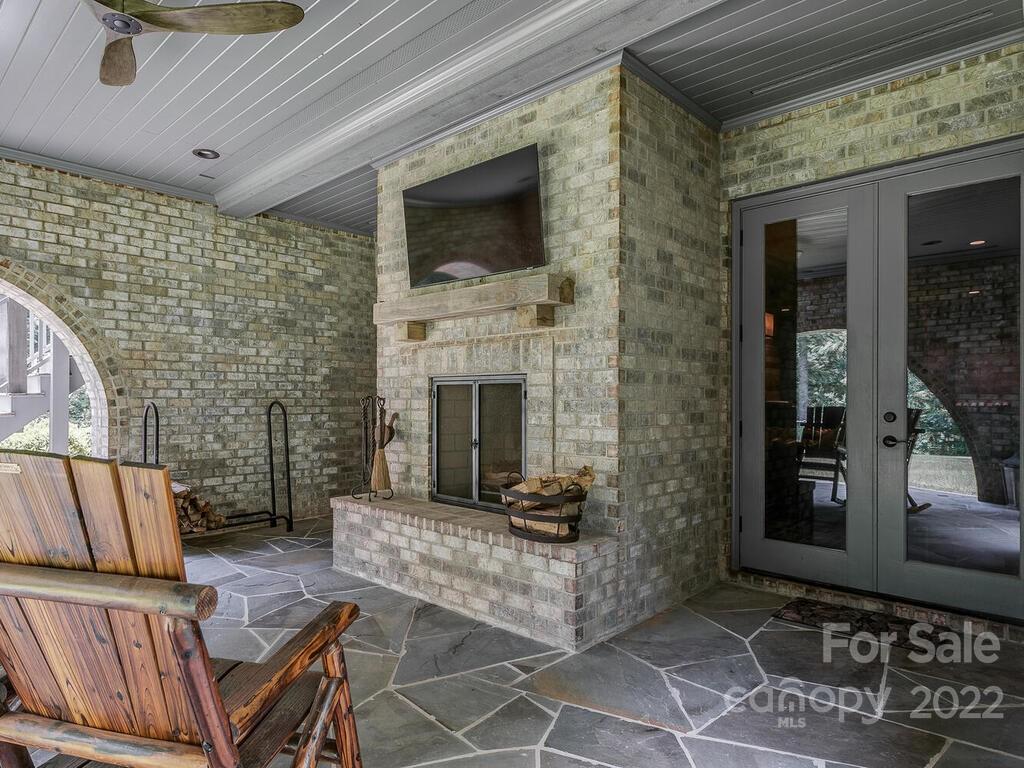 13601 Girl Scout Road Charlotte, NC 28278 - Photo 38 of 45 a living room with furniture and a fireplace