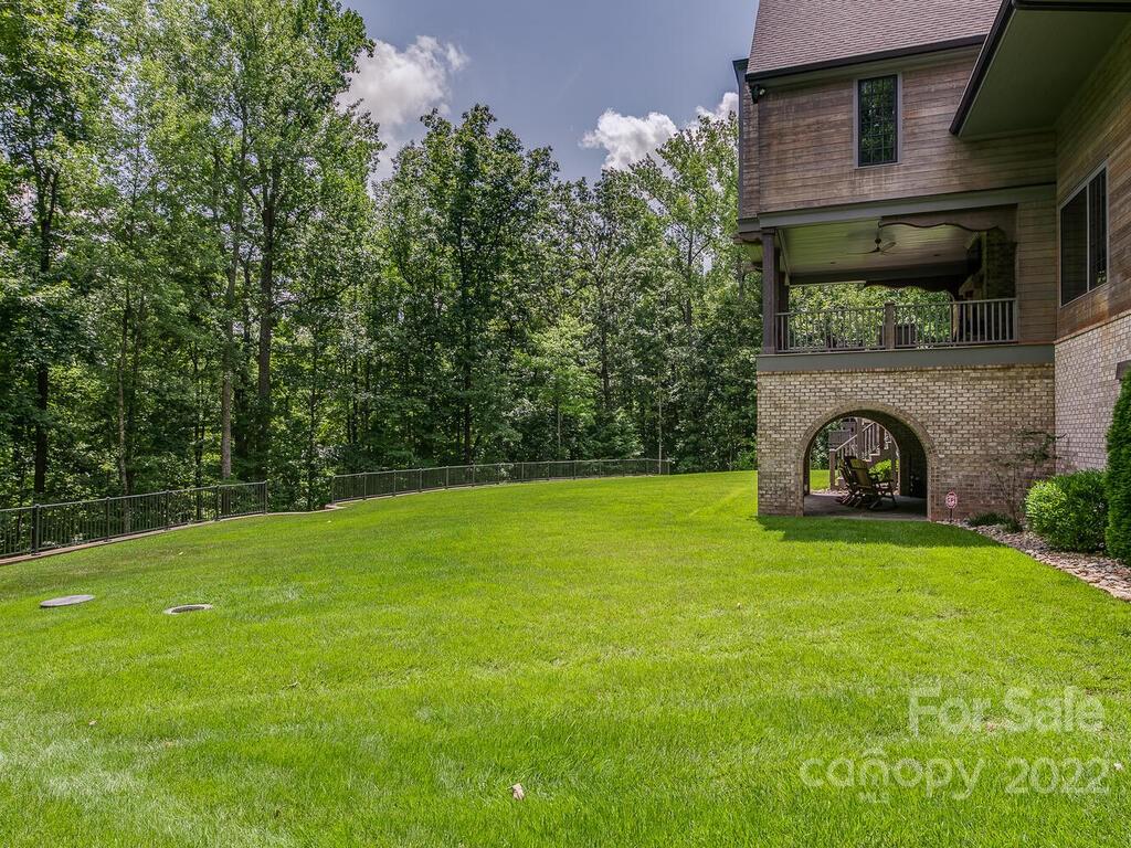 13601 Girl Scout Road Charlotte, NC 28278 - Photo 41 of 45 a front view of a house with garden