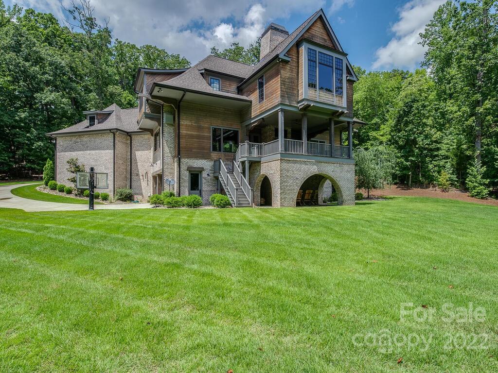 13601 Girl Scout Road Charlotte, NC 28278 - Photo 42 of 45 a view of outdoor space yard and front view of a house