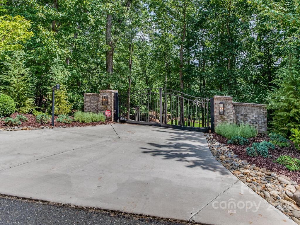 13601 Girl Scout Road Charlotte, NC 28278 - Photo 44 of 45 a view of a street with a trees