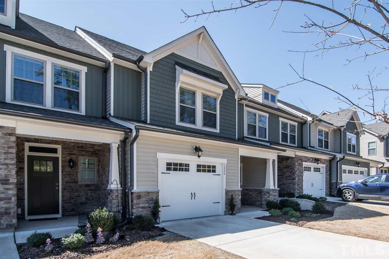 1240 Exchange Place Durham, NC 27713 - Photo 1 of 30 a front view of a house with yard