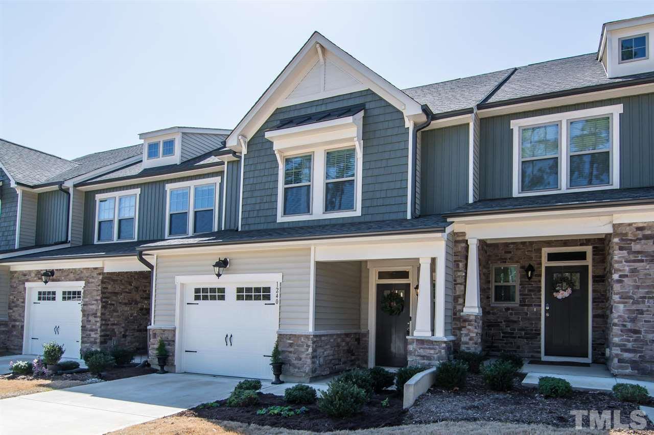 1240 Exchange Place Durham, NC 27713 - Photo 2 of 30 a front view of a house with plants