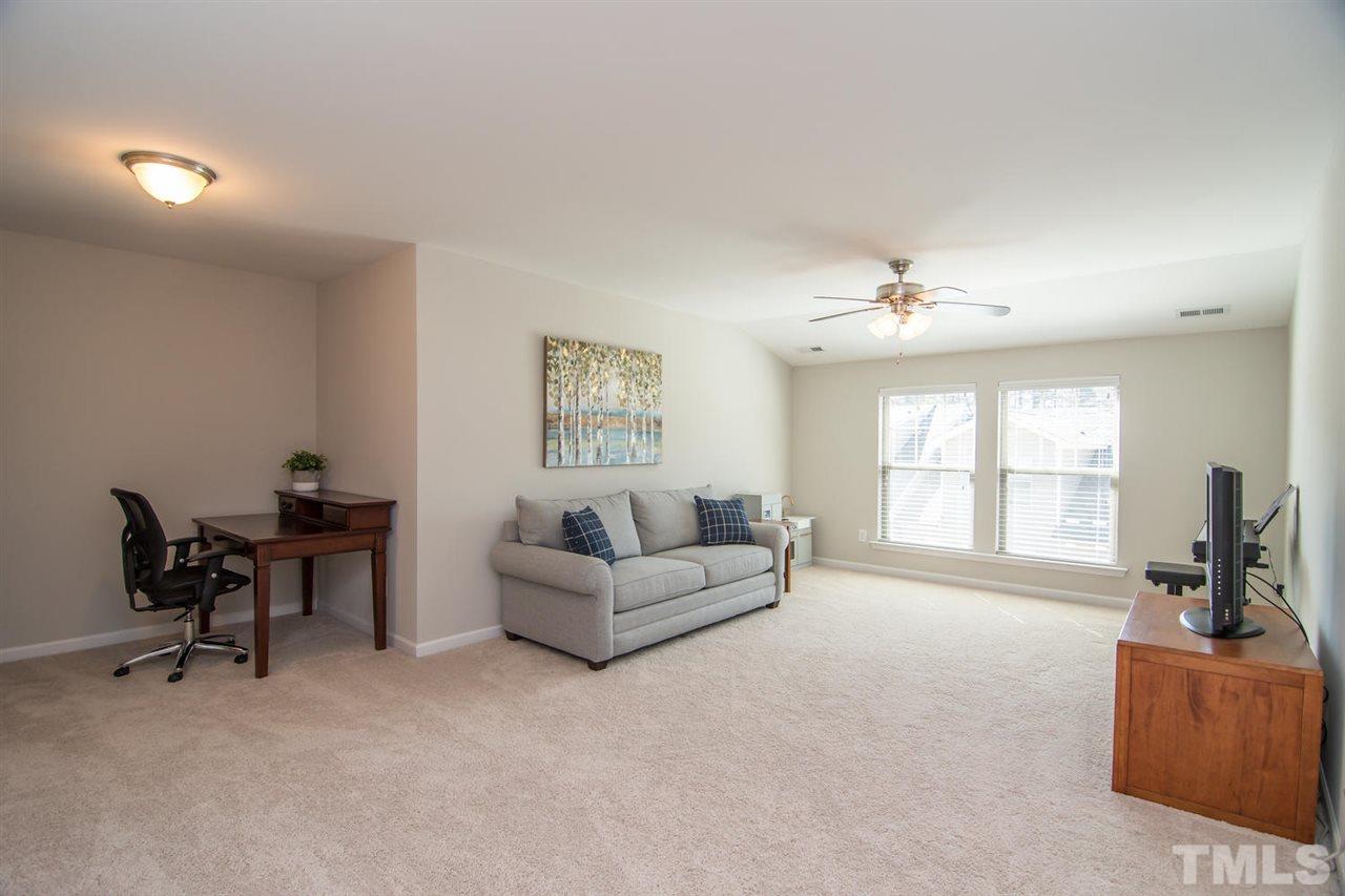 1240 Exchange Place Durham, NC 27713 - Photo 22 of 30 a living room with furniture and a window