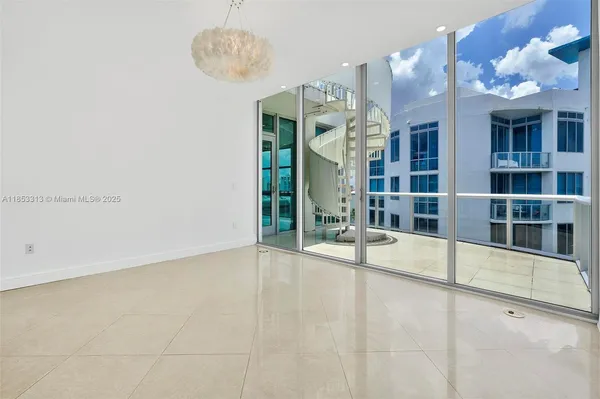 a bathroom with a granite countertop double vanity sink a mirror and a bathtub