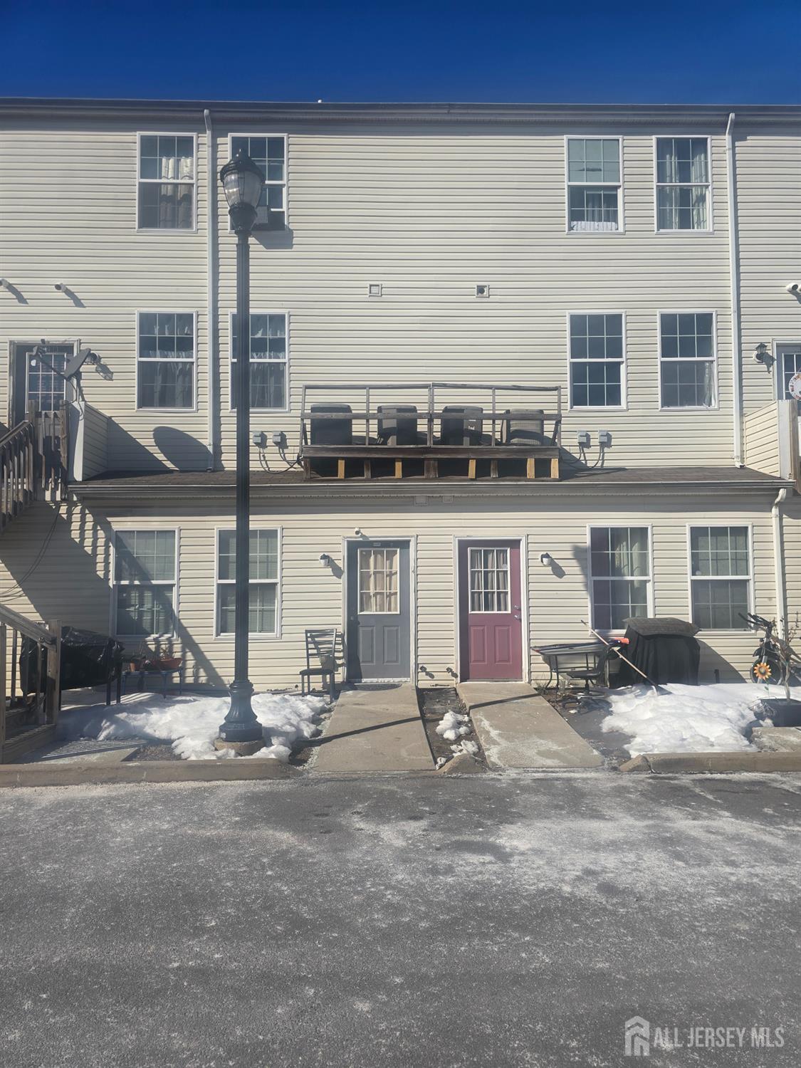132 Remsen Avenue New Brunswick, NJ 08901 - Photo 11 of 11 a view of a patio with table and chairs near a barn