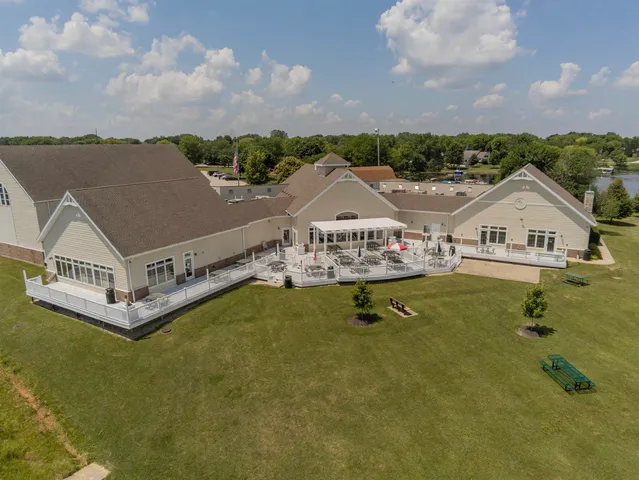 a view of house with outdoor space and sitting space