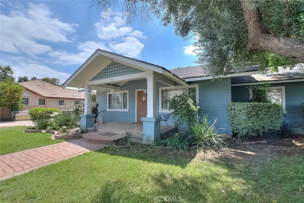 220 East Duarte Road Arcadia, CA 91006 - Photo 8 of 10 a front view of a house with a yard
