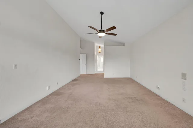 a spacious bathroom with a bathtub sink and mirror