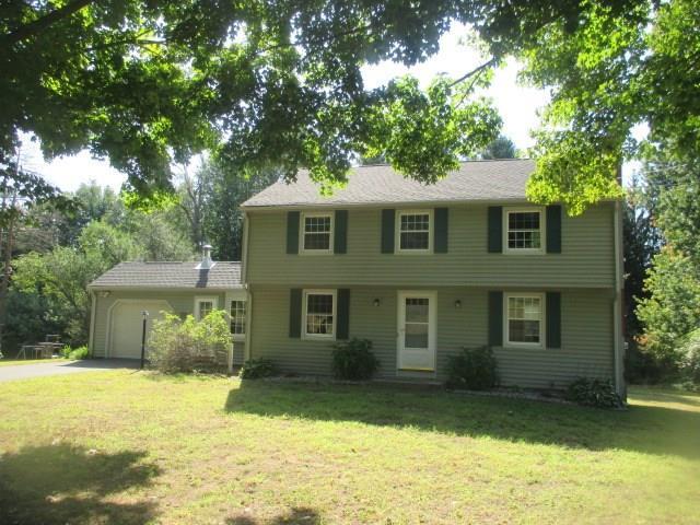173 Springfield Road Somers, CT 06071 - Photo 1 of 1 a front view of a house with a yard