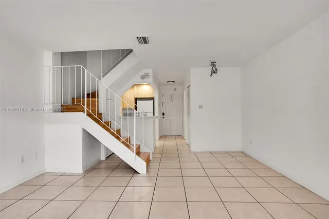 a view of an entryway with staircase