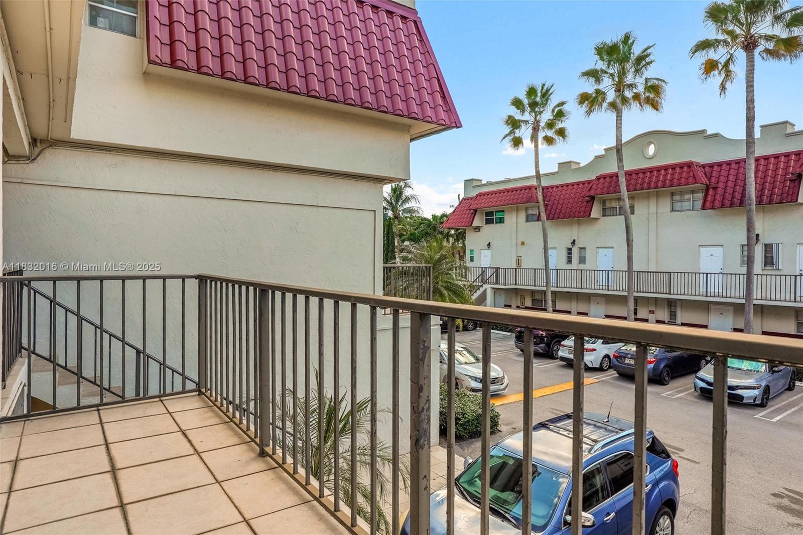 8650 Southwest 67th Avenue, Unit 1025 Pinecrest, FL 33156 - Photo 15 of 26 a view of a balcony with a potted plants