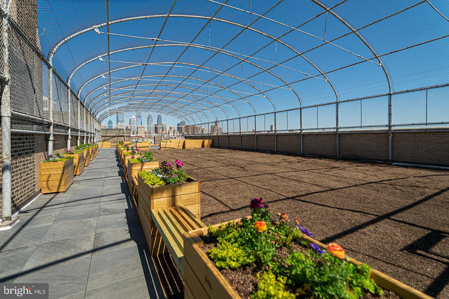 1300 South 19th Street, Unit 316 Philadelphia, PA 19146 - Photo 11 of 19 a view of a patio with table and chairs